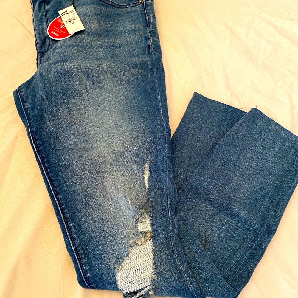 Express distressed jean leggings 14R